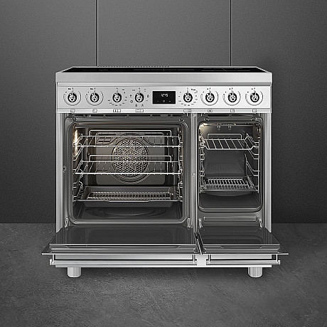 Smeg - 90cm bred induktionsspis med dubbelugn,stänkskydd och fläkt