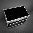 Smeg - Rostfri 90cm bred induktionsspis med dubbelugn, stänkskydd & fläkt Smeg - Rostfri 90cm bred induktionsspis med dubbelugn, stänkskydd & fläkt